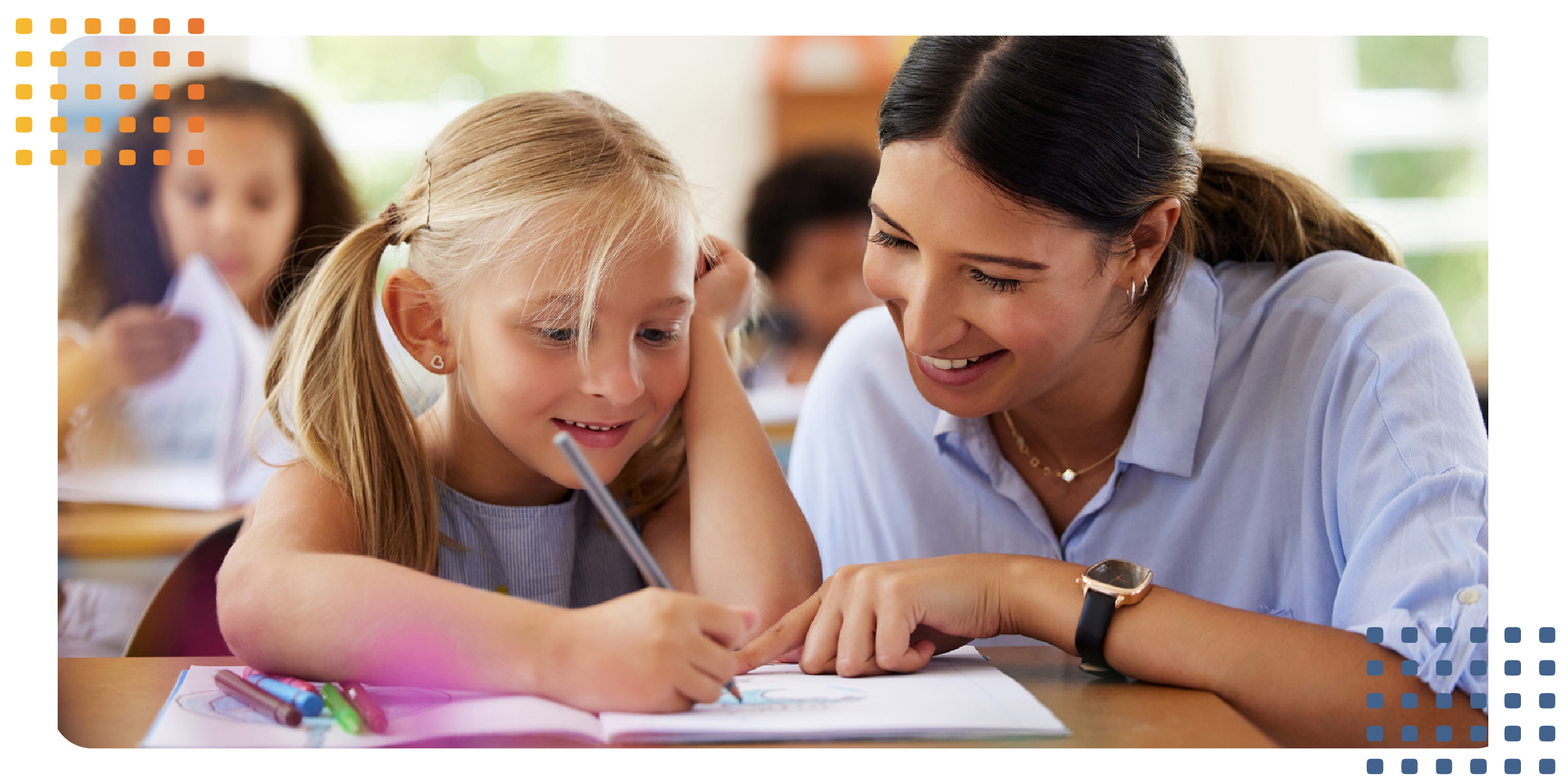 a teacher shows a student how to solve a math problem