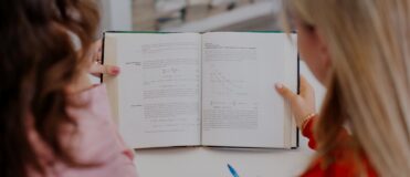 Students reading book