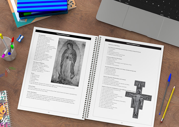 Catholic school planner open to a page showing Catholic prayers including the rosary